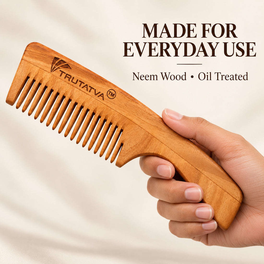 Trutatva Neem wood comb with wide-tooth design